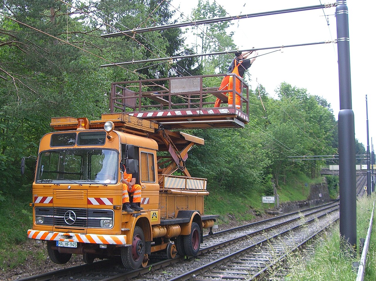 Road-rail vehicle used for overhead line maintenance